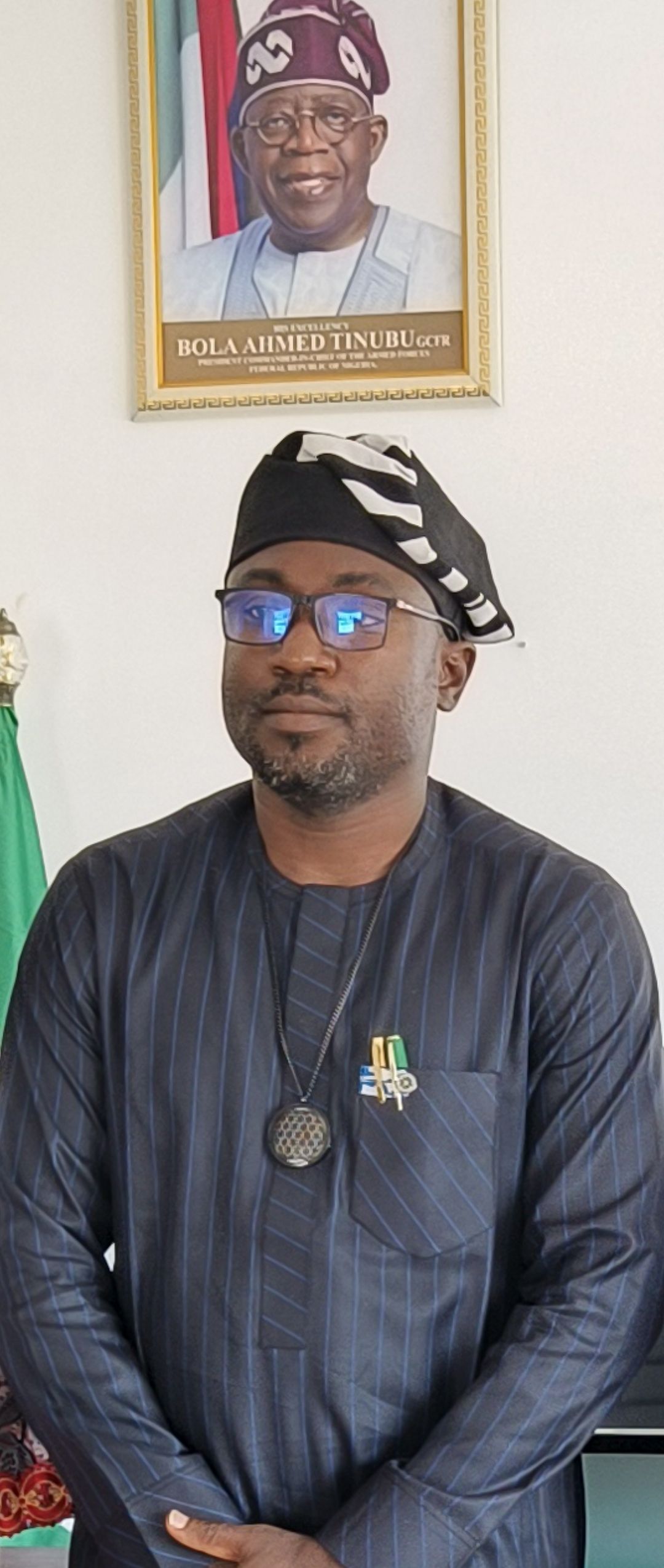 Portrait of Yenge Raphael Aondoaseer in formal attire